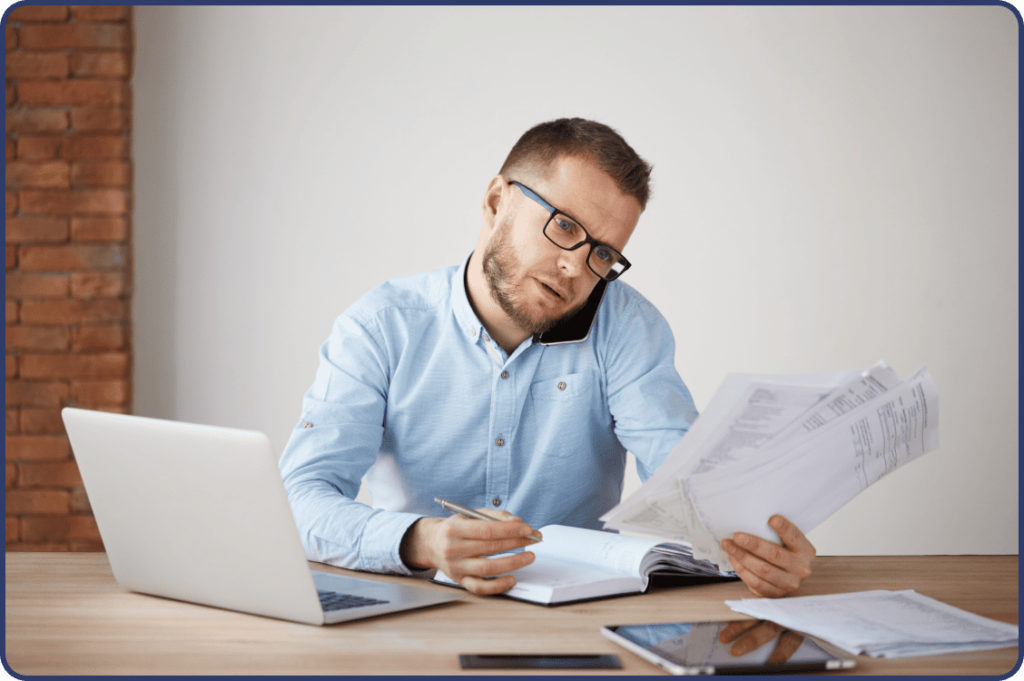 busy concentzzrated businessman glasses shirt sitting comfortable office 1